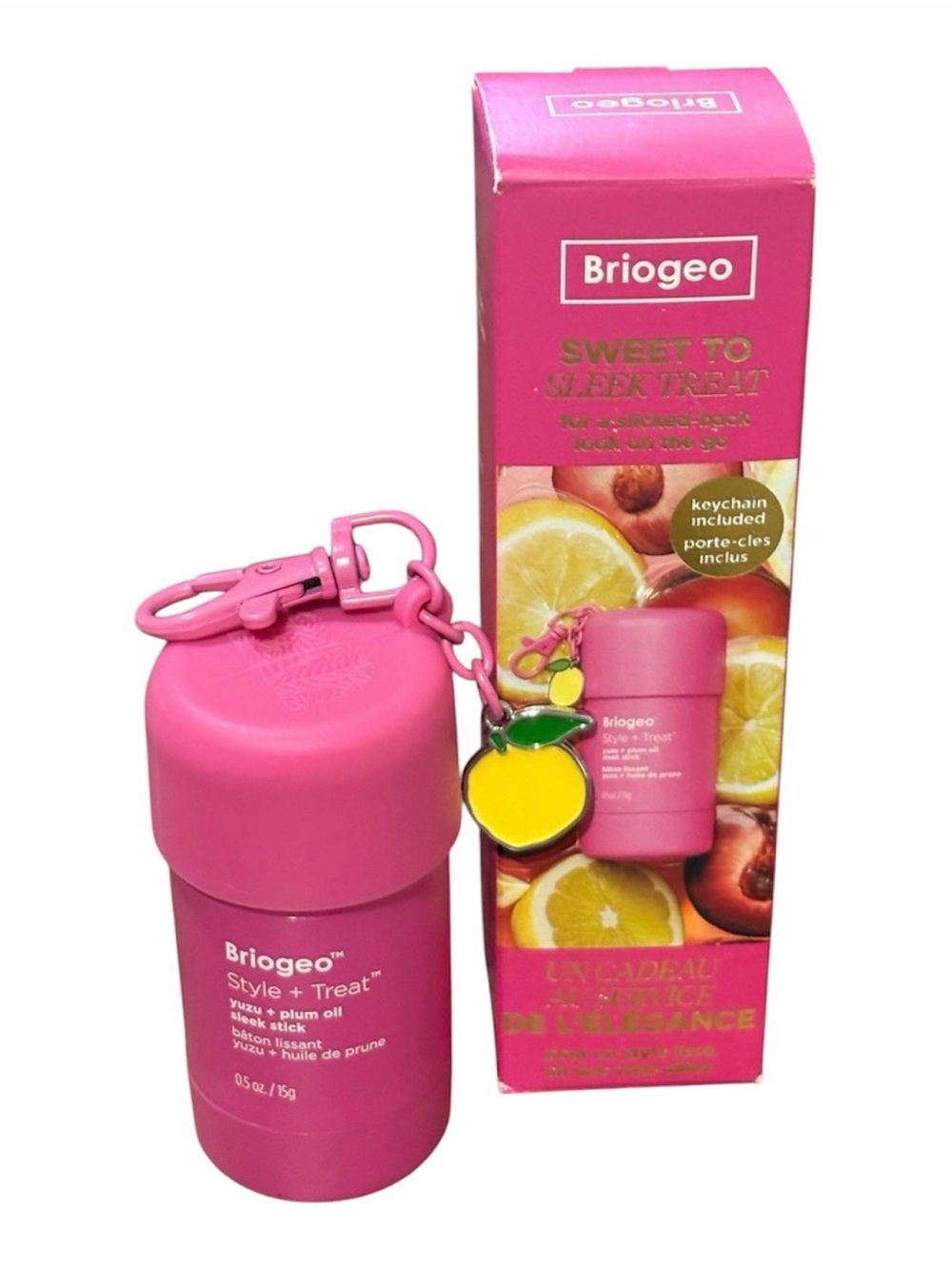 Briogeo pink Sweet to Sleek Treat oil stick with lemon charm